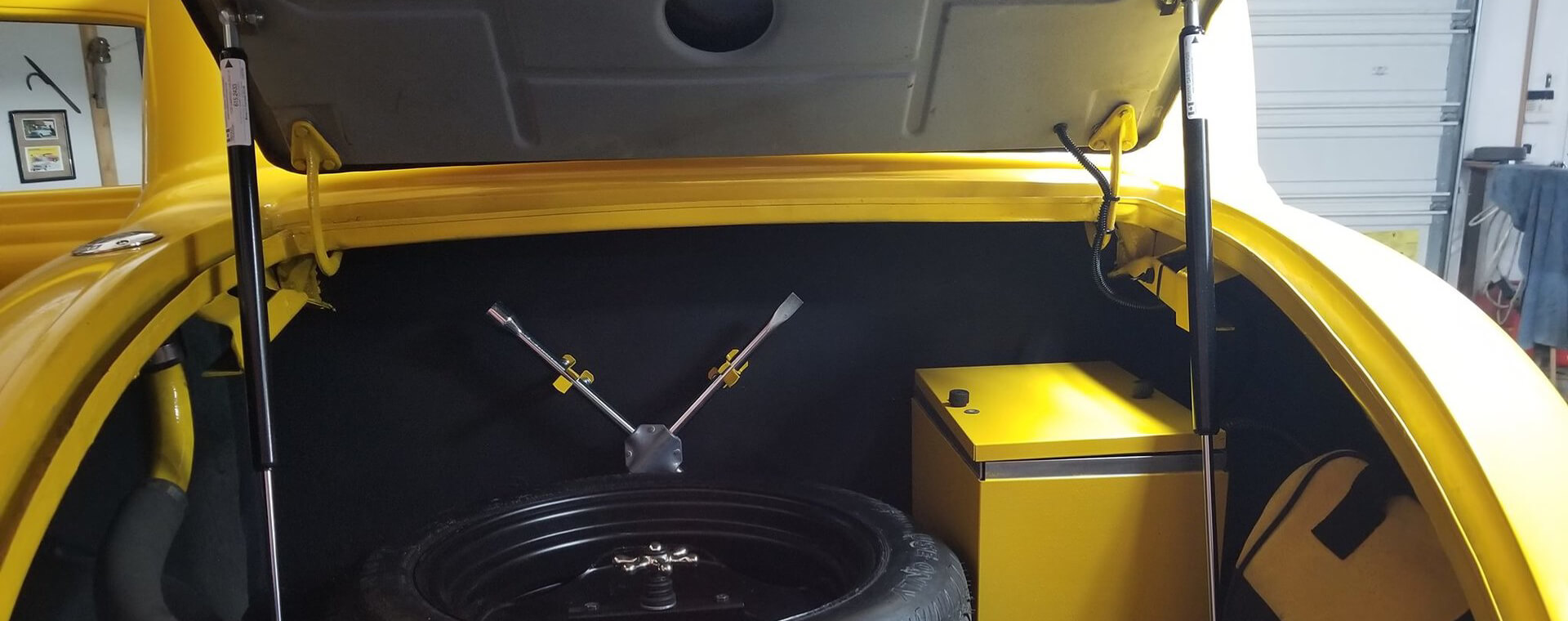 Gemini Gas Springs mounted in a classic car trunk
